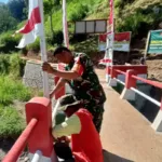 Lautan Merah Putih Selimuti Jembatan Garuda, Babinsa dan Warga Gadingsari Kobarkan Semangat HUT RI ke-81